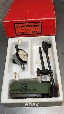 Mitutoyo No. 7024 magnetic base with Starrett 81-141.250 dial indicator U. S. A