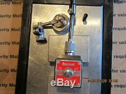 Starrett #196 indicator and Starrett #657A magnetic base. Condition used