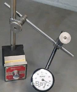 Starrett No. 657A magnetic base with a Mitutoyo No. 1157 dial indicator set