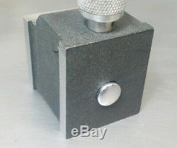 Starrett No. 657A magnetic base with a Starrett No. 81-141.250 dial indicator