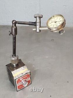 Starrett No. 657C magnetic base with Starrett No. 196 dial indicator 657A